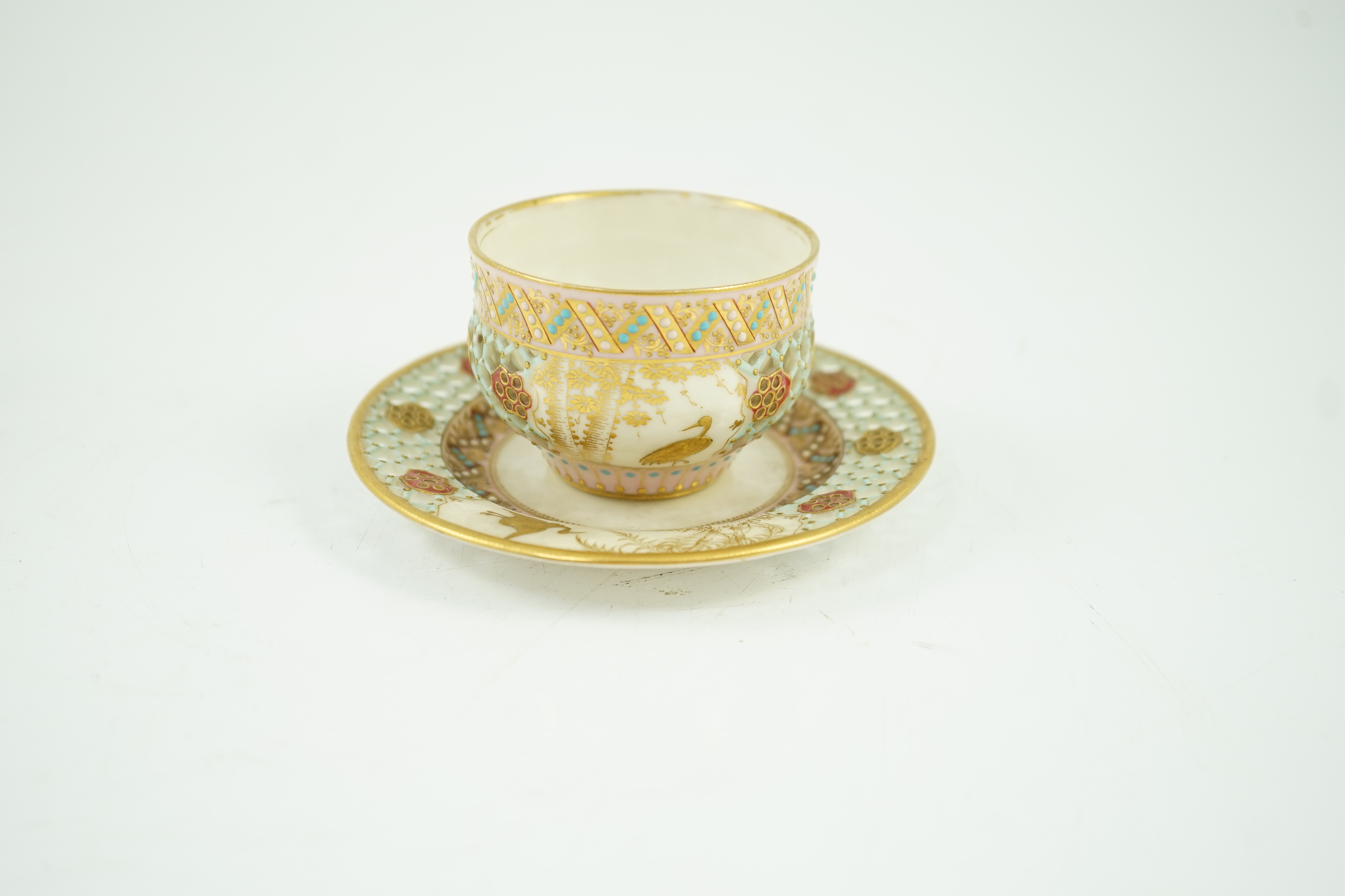 A Royal Worcester reticulated miniature cabinet cup and saucer, late 19th century